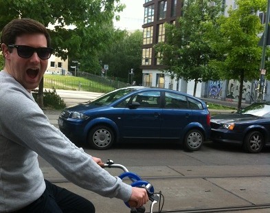 Josh from The Carter Company's team tours Berlin on a bike