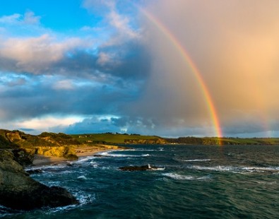 Rainbow in summer over the sea in Cornwall