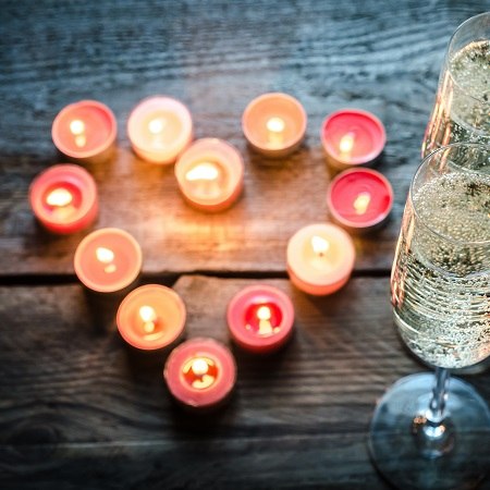 colourful candles and a drink are winter warmers 