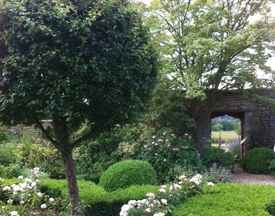 Broughton Castle's garden near Banbury - visit this historic place on our bespoke Oxford walking holidays